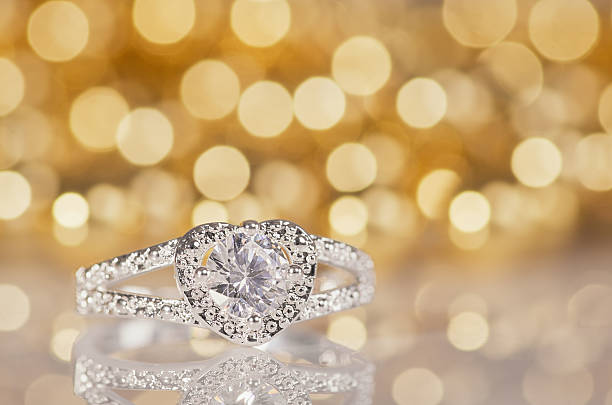 istock Silver ring in the shape of a heart. 621594406