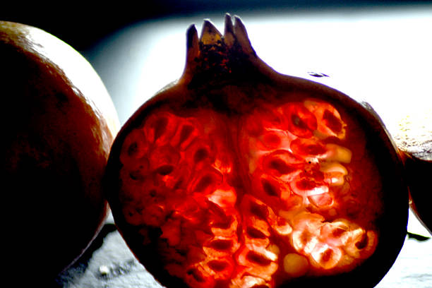 istock Detail of Pomegranate isolated backlit 621594910