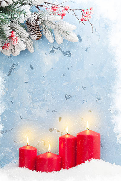 istock Christmas candles and fir tree 621595036