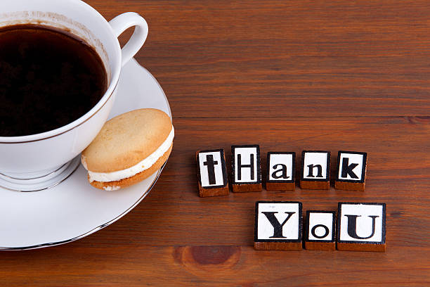 istock Thank You. On wooden table coffee mug, cookie 621596920