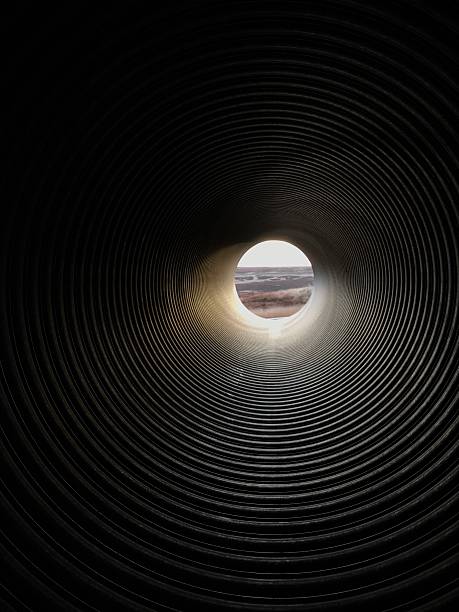 istock Circular Moorland landscape detail through pipe 621597860