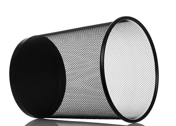 istock Blank black metal waste basket isolated on white. 621599380