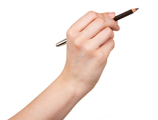 istock Black pencil makeup in female hand isolated on white background. 621599504