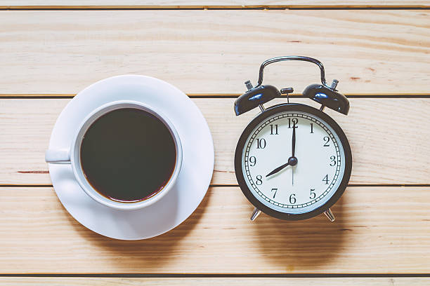 istock Cup with coffee on wooden table - Coffee time concept 621601750