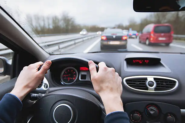 Photo of driving car on highway