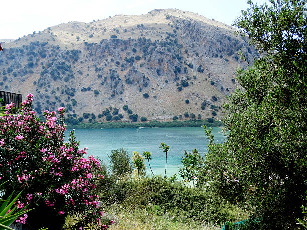 istock panoramic view of mountain lake Greece 621602002