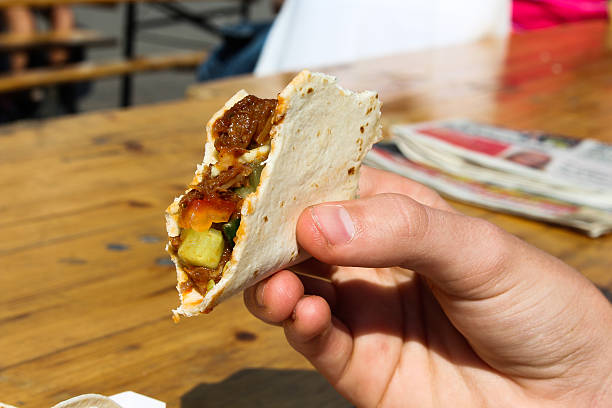 Mexican beef tacos on a wooden table.Here is an alternative version: