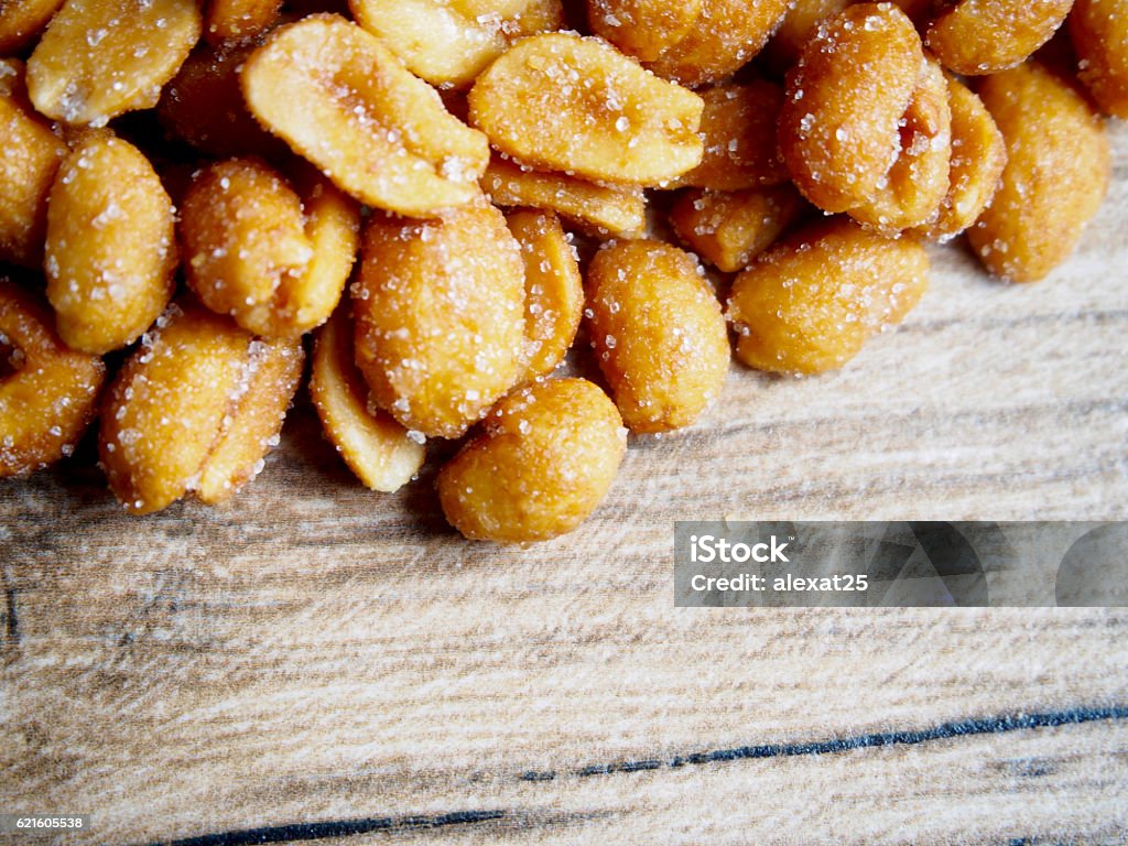 Peanuts with honey Peanuts with honey background Peanut - Food Stock Photo
