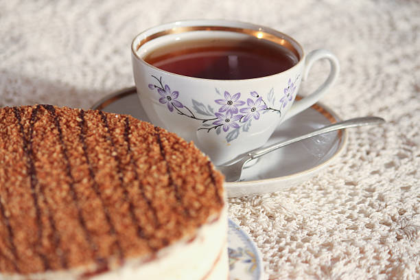 istock delicious cake on a plate and tea 621605792