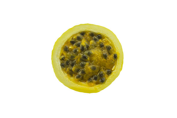 istock Ripe yellow passion fruit half cut  isolated on white 621607324