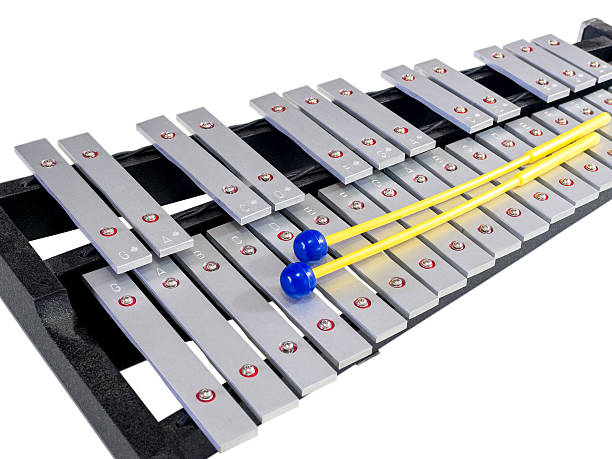 istock Xylophone with mallets on isolated white background, selective f 621608394