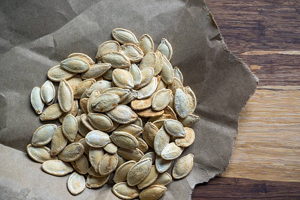 istock Grilled Pumpkin seeds with sea salt and spices 621608866