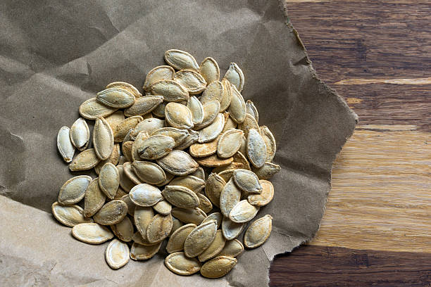 istock Grilled Pumpkin seeds with sea salt and spices 621609108