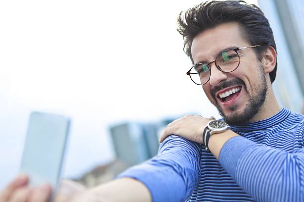 istock Being a happy selfie man 621609640