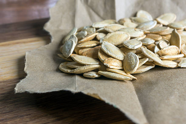 istock Grilled Pumpkin seeds with sea salt and spices 621609708