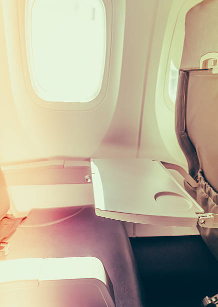 istock Tray on back of aeroplane seat 621609818