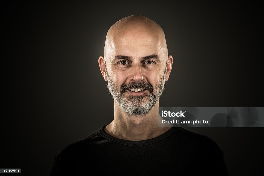 happy man bald head stubble beard portrait smiling mid adult man with bald head and stubble beard 40-44 Years Stock Photo