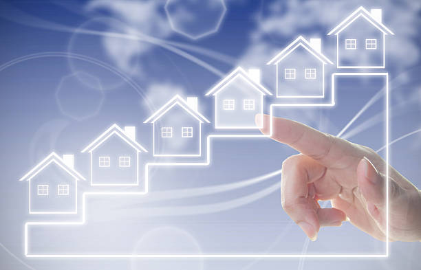 istock Hand clicking on house symbol 621610440