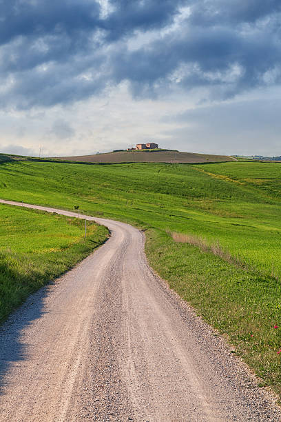 istock Typical Tuscany landscape and road , green hills springtime 621610718