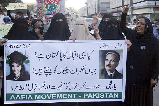 Protest demonstration as they demanding to release Aafia Siddiqui stock photo
