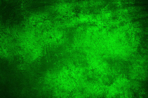 istock green fabric artistic background with simulated blurred ink. 621612934