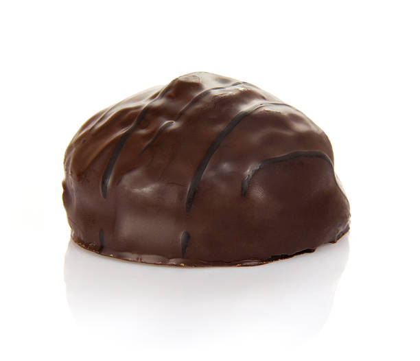 istock Delicious dark chocolate pralines isolated on white. 621614854