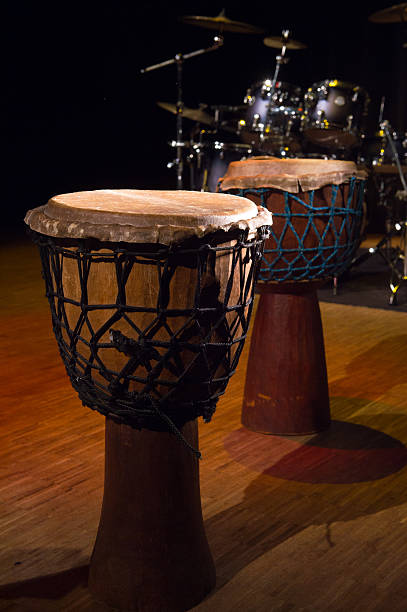istock Traditional wooden african djembe drumon stage 621615256