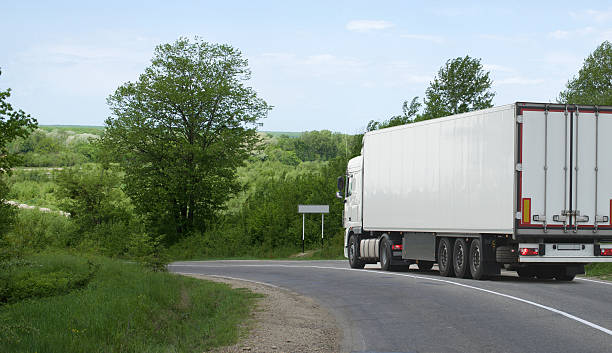 istock The truck on asphalt road. 621615358