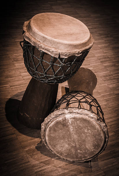 istock Traditional wooden african djembe drumon stage 621615622