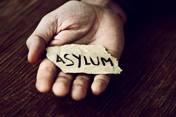 istock piece of paper with the word asylum 621616340
