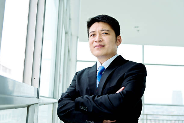 istock Young asian businessman in office 621687118