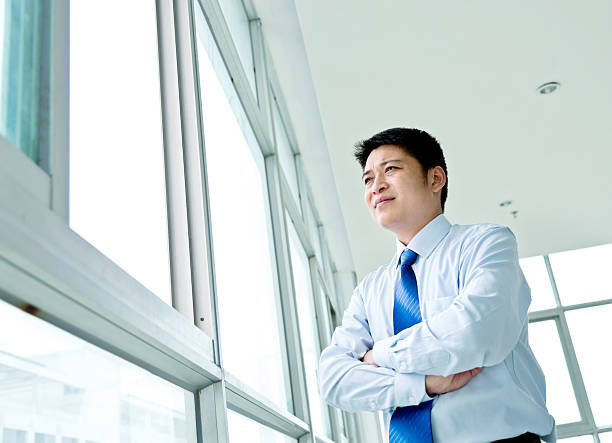 istock Young asian businessman in office 621687724