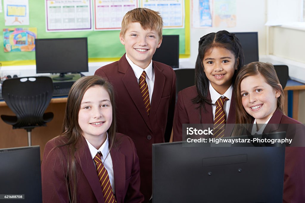 Portrait Of Elementary School Pupils In Computer Class Private School Education Stock Photo