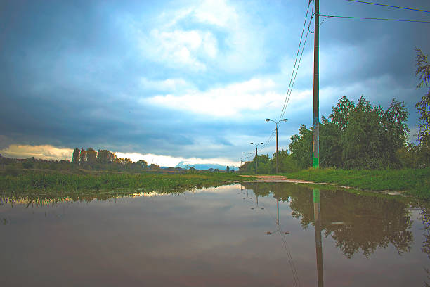 istock Reflection in water of Dramatic sky 621688958