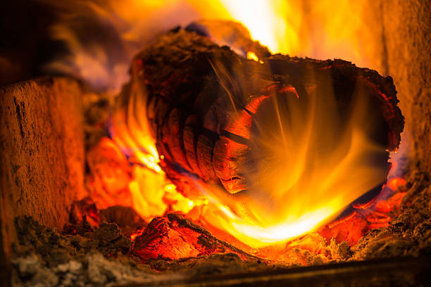 dekorative farben des feuers - ash fireplace fire log stock-fotos und bilder