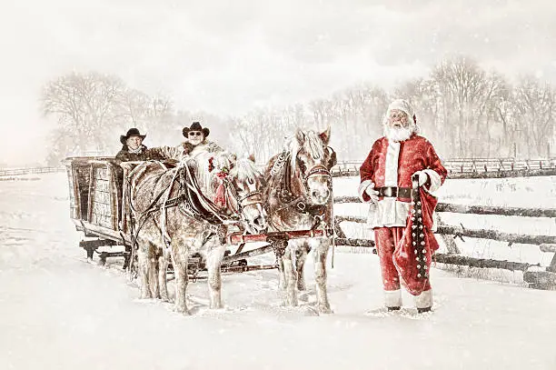 Photo of Santa With a Team of Horses Sled and Two Cowboys