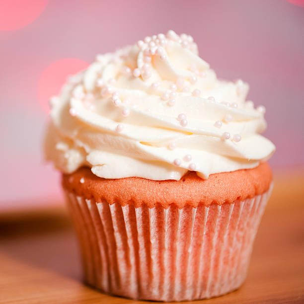 istock Creamy cupcake closeup 621689960