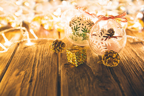 istock Christmas decorations on wooden table 621691190