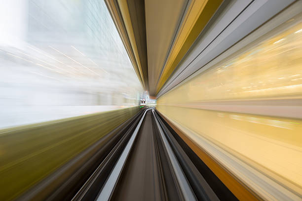 istock Speed motion in urban highway road tunnel 621691434