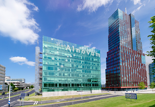 Almere, netherlands - August 3, 2014: modern office buildings in Almere. It is the youngest and fastest growing city in the country, founded around 1975.