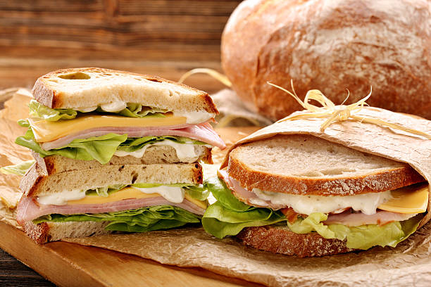 istock Fresh sandwich with ham cheese and lettuce 621693826