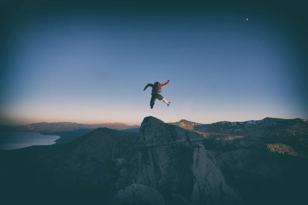 istock Jumping for joy over Lake Tahoe mountains 621695424