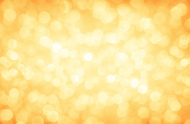 Golden glitter defocused lights christmas abstract background