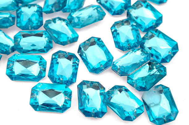 Blue rhinestones Blue rhinestones on white background turquoise gemstone stock pictures, royalty-free photos & images