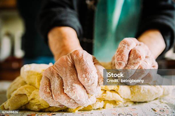Close Up Of Old Italian Ladys Hands Making Italian Pasta Stock Photo - Download Image Now