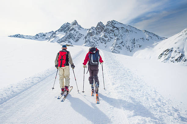 istock Group of climbers roped to the summit 621700190