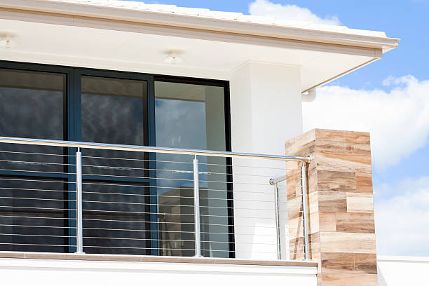 istock Closeup top part of modern house with balcony, copy space 621703962