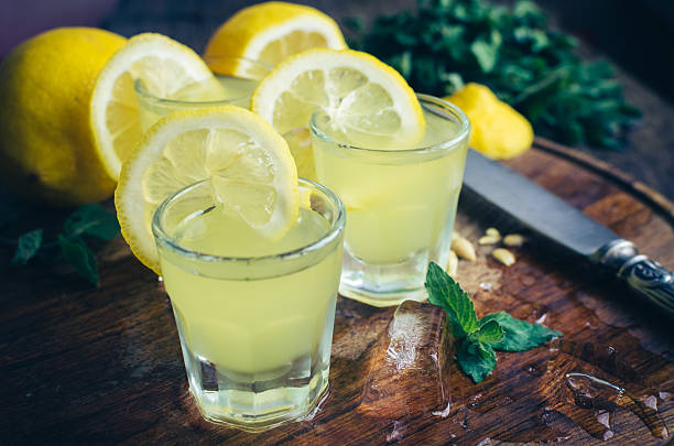 istock Italian traditional liqueur limoncello with lemon 621704104