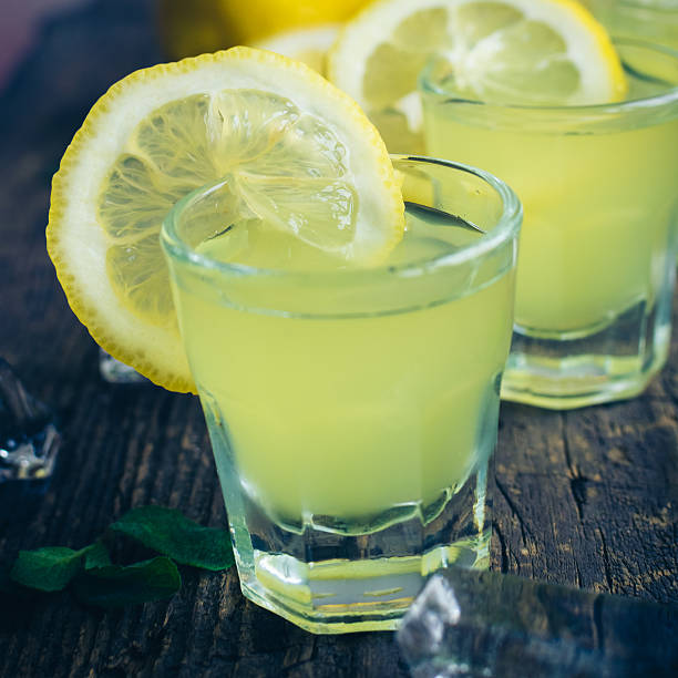 istock Italian traditional liqueur limoncello with lemon 621704212