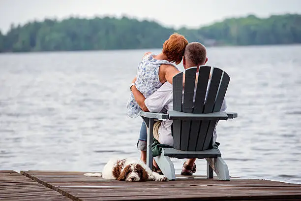 Photo of Couple on Dock with Dog